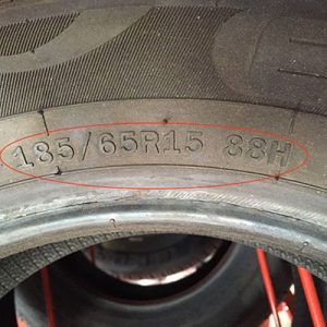 dimensions indiquées sur le pneu